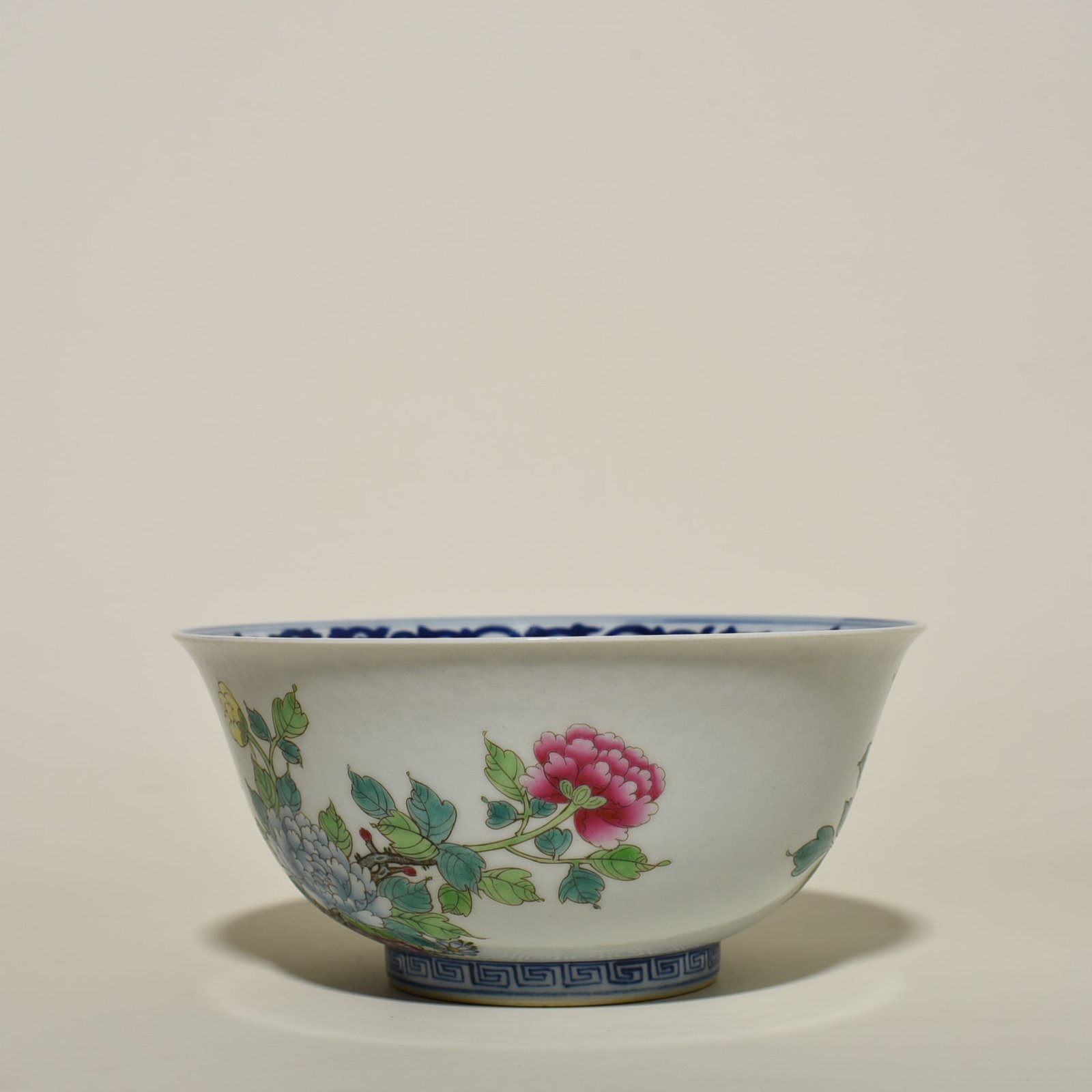 Qing Dynasty Qianlong blue and white pastel golden pheasant peony bowl