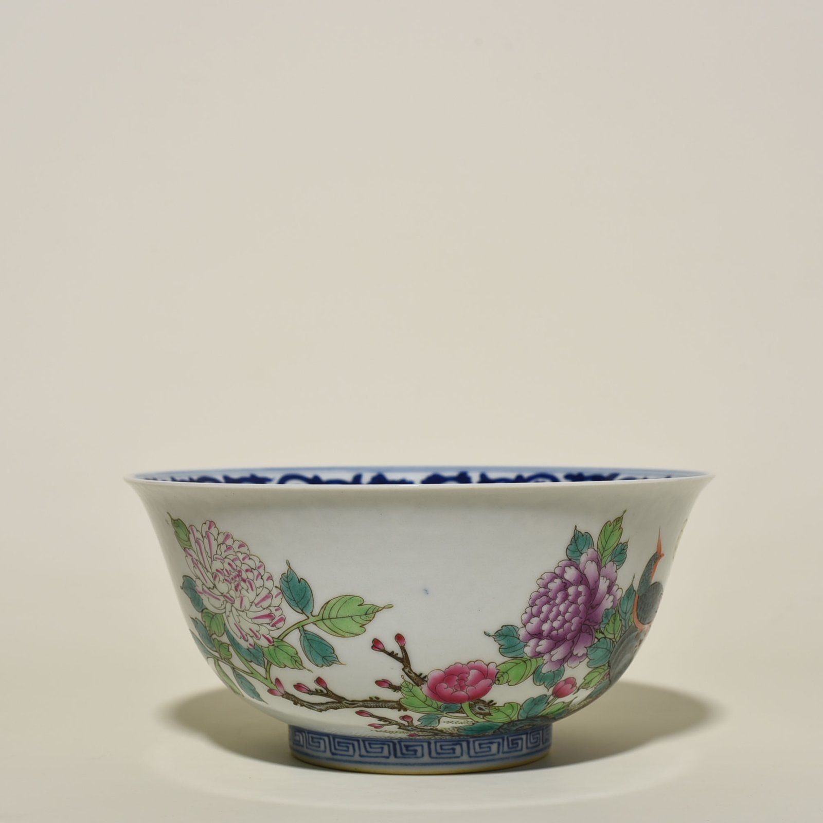 Qing Dynasty Qianlong blue and white pastel golden pheasant peony bowl