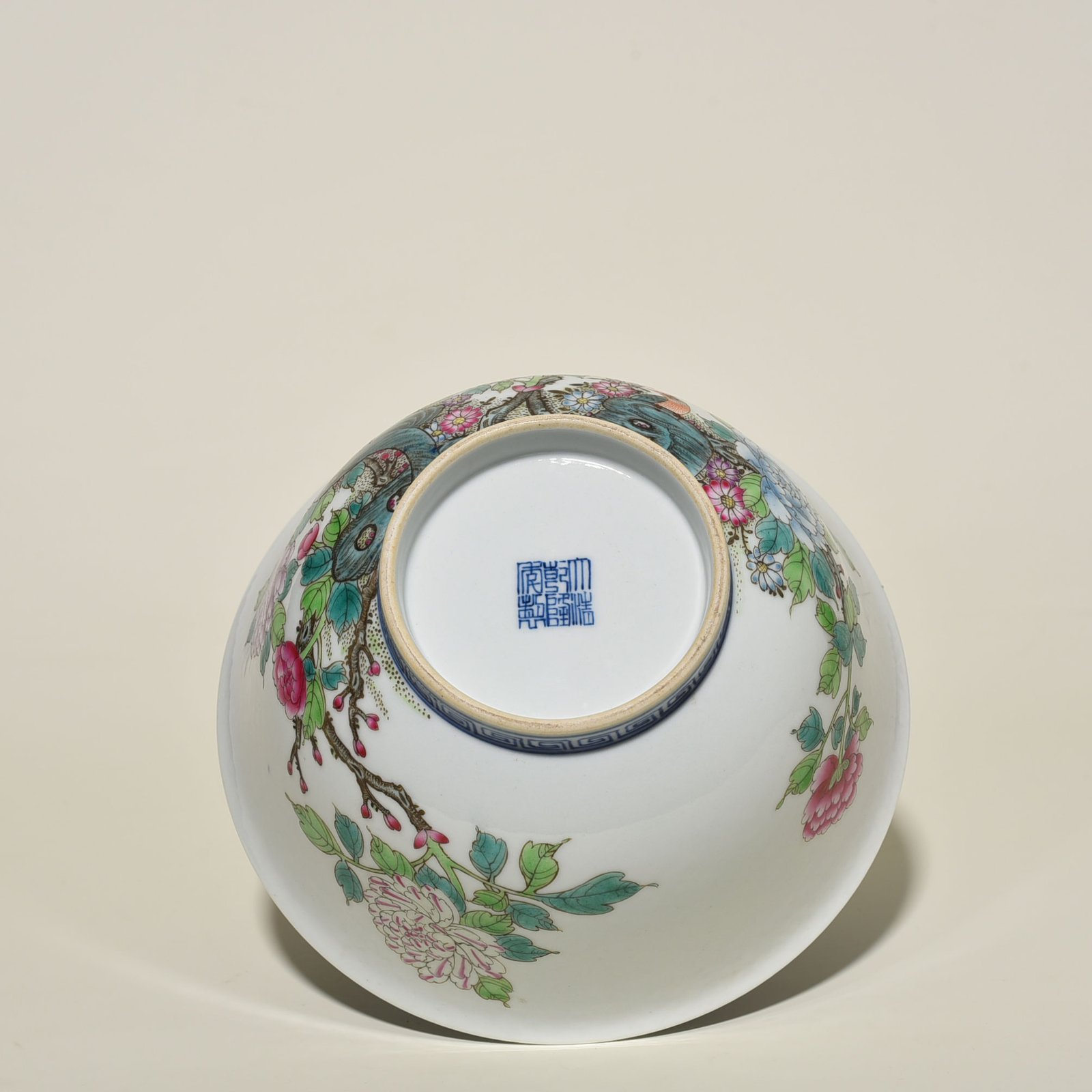 Qing Dynasty Qianlong blue and white pastel golden pheasant peony bowl