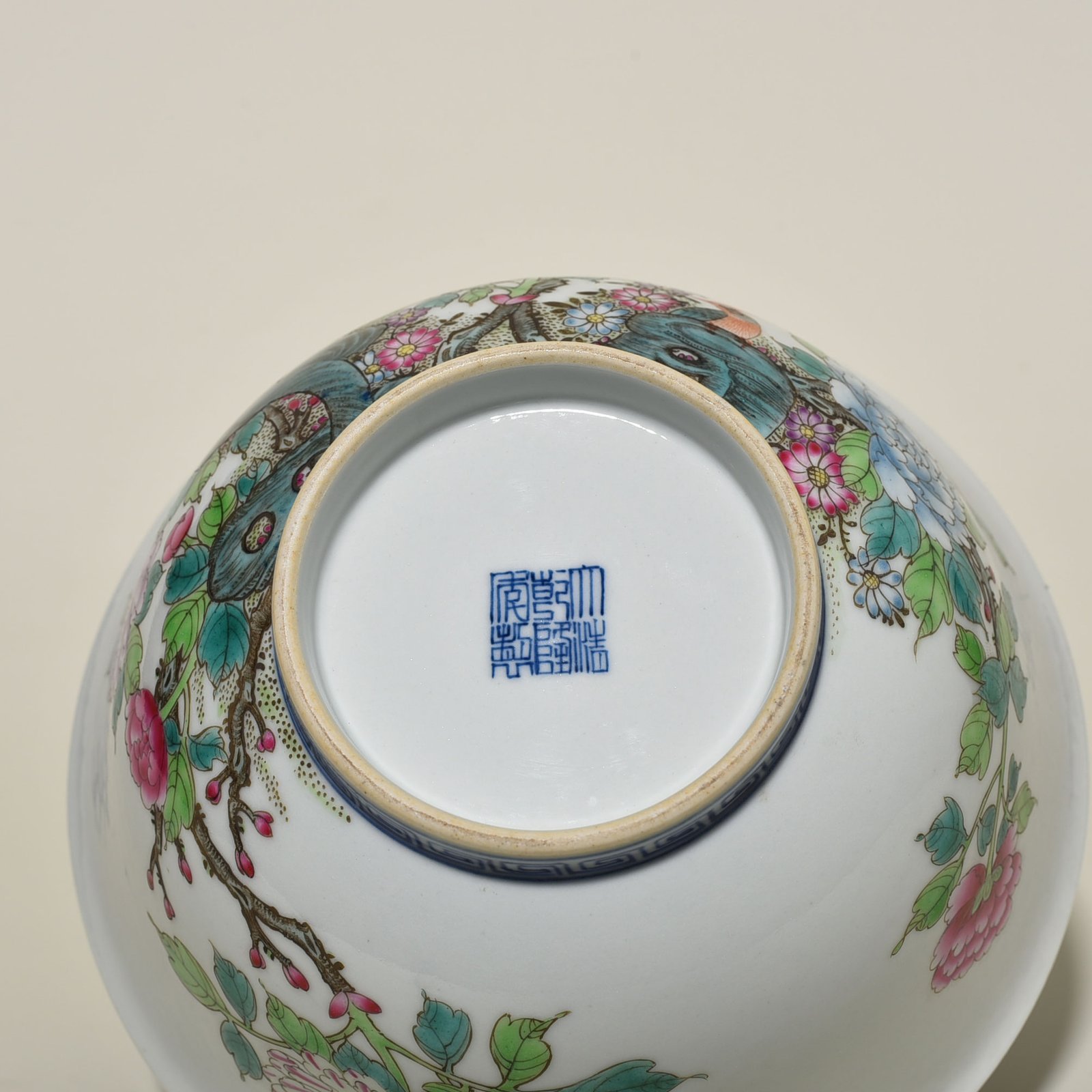 Qing Dynasty Qianlong blue and white pastel golden pheasant peony bowl