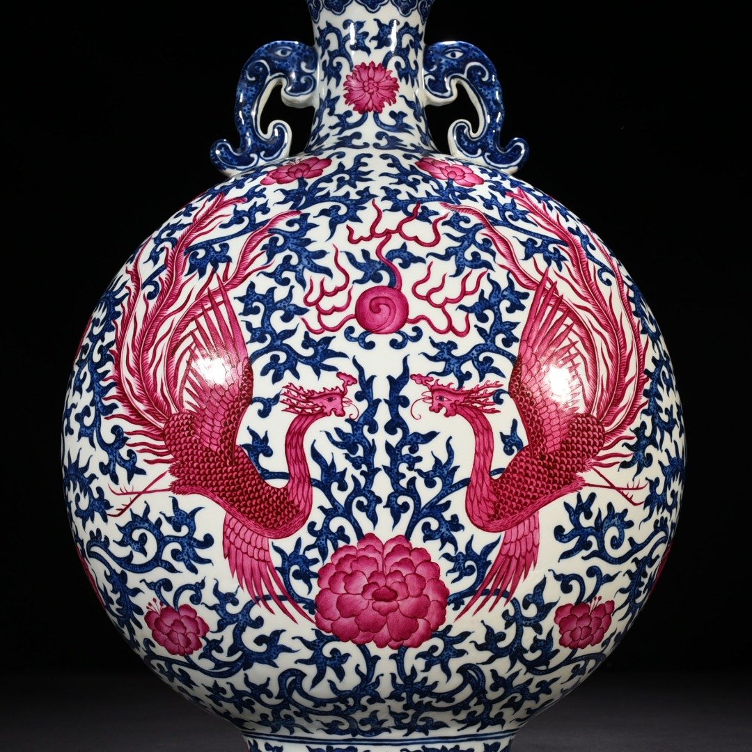 Qing Dynasty Qianlong blue and white intertwined branches rouge red phoenix flat vase