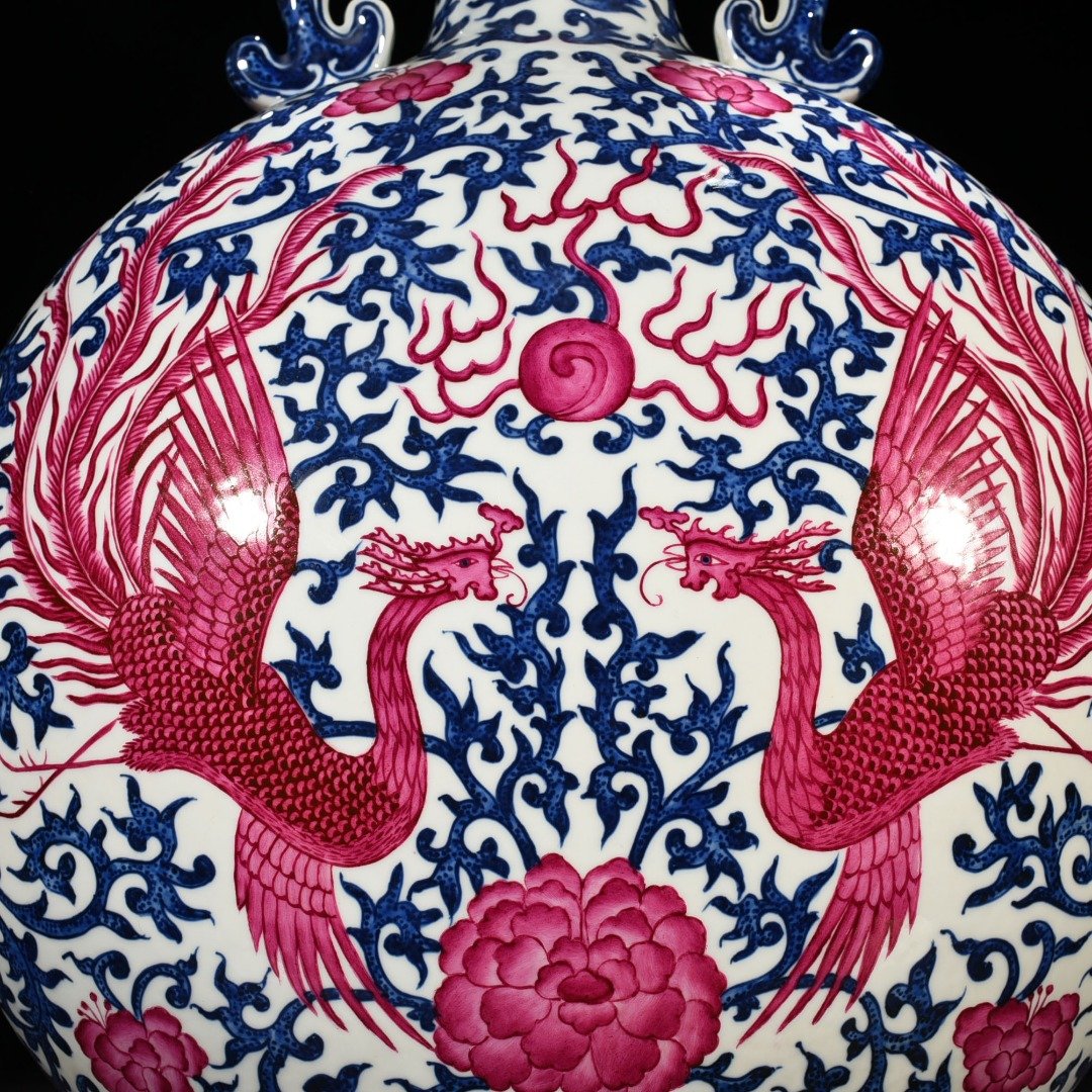 Qing Dynasty Qianlong blue and white intertwined branches rouge red phoenix flat vase