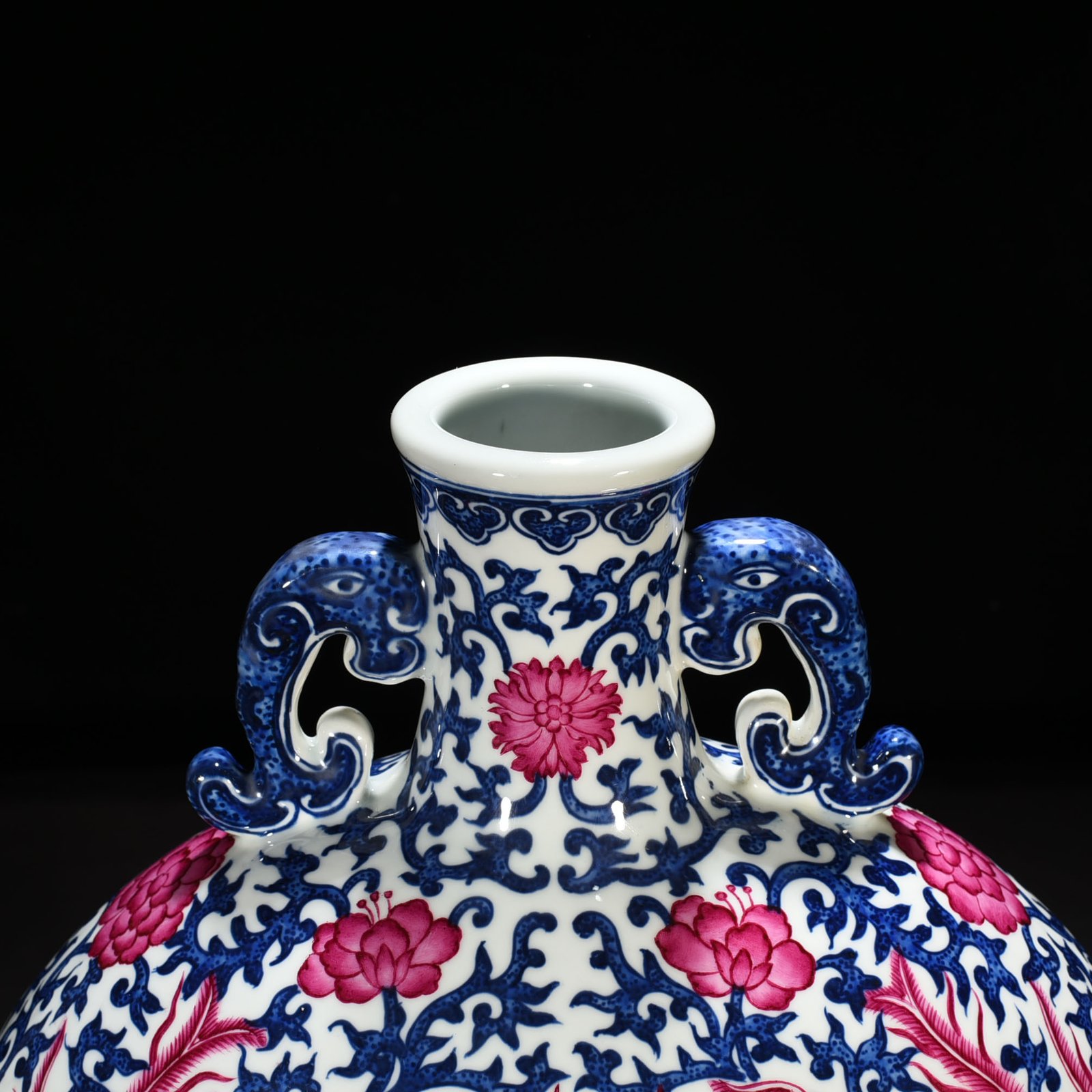 Qing Dynasty Qianlong blue and white intertwined branches rouge red phoenix flat vase