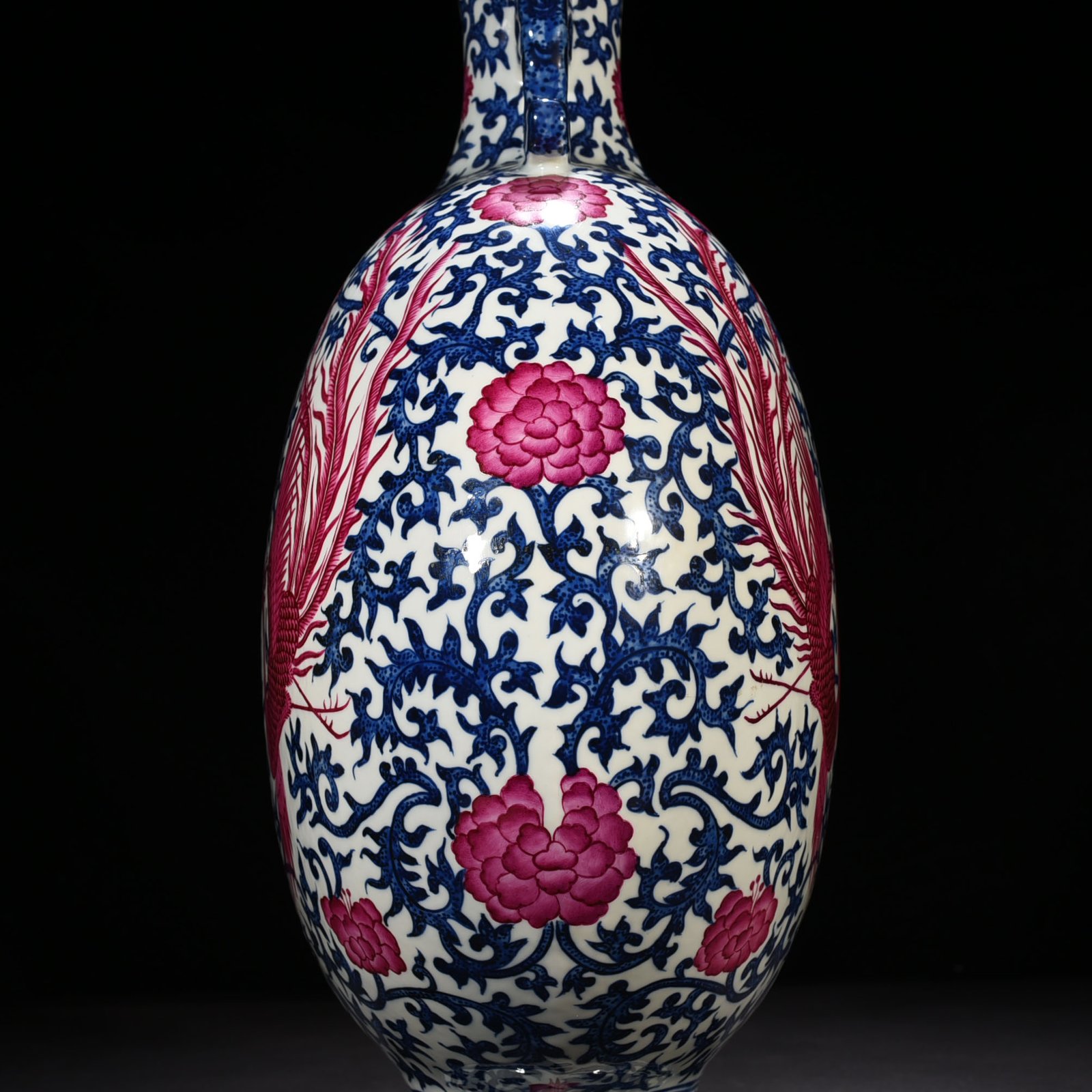 Qing Dynasty Qianlong blue and white intertwined branches rouge red phoenix flat vase