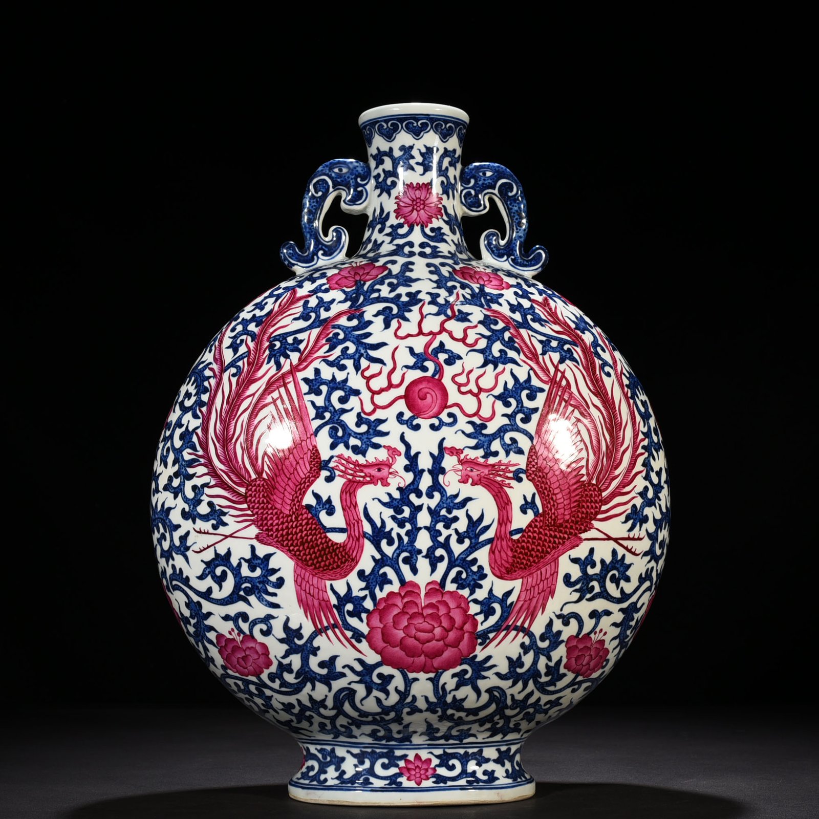 Qing Dynasty Qianlong blue and white intertwined branches rouge red phoenix flat vase