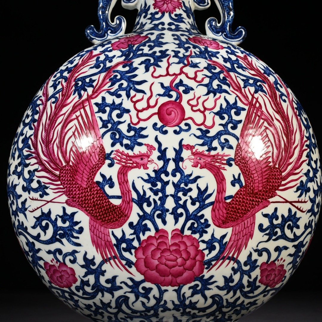 Qing Dynasty Qianlong blue and white intertwined branches rouge red phoenix flat vase