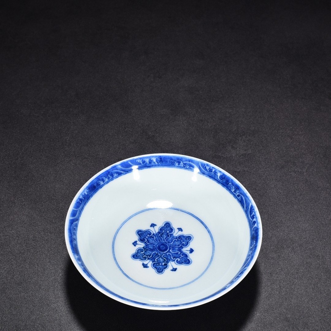Qing Dynasty Qianlong blue and white flower high plate