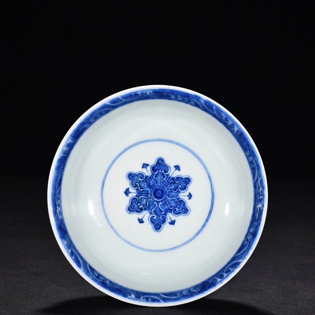 Qing Dynasty Qianlong blue and white flower high plate