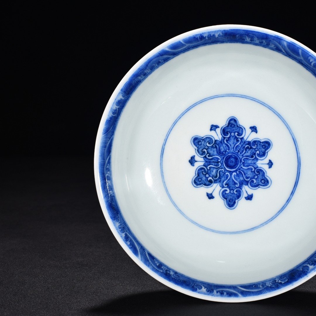 Qing Dynasty Qianlong blue and white flower high plate