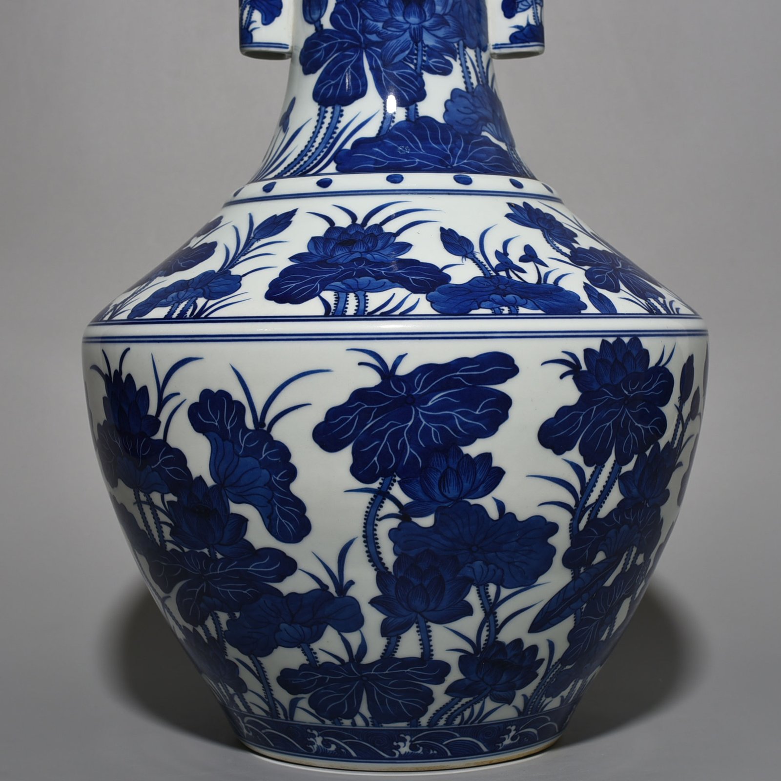 Qing Dynasty Qianlong blue and white lotus vase