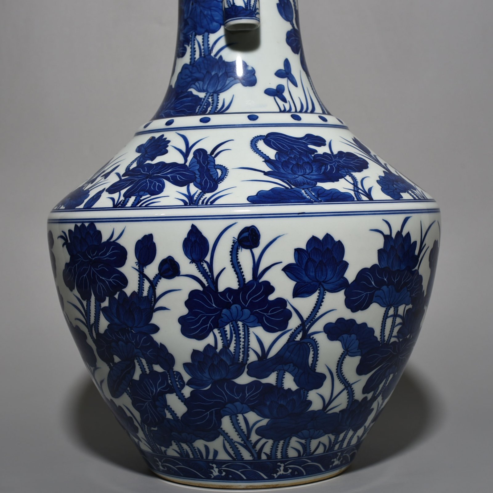 Qing Dynasty Qianlong blue and white lotus vase