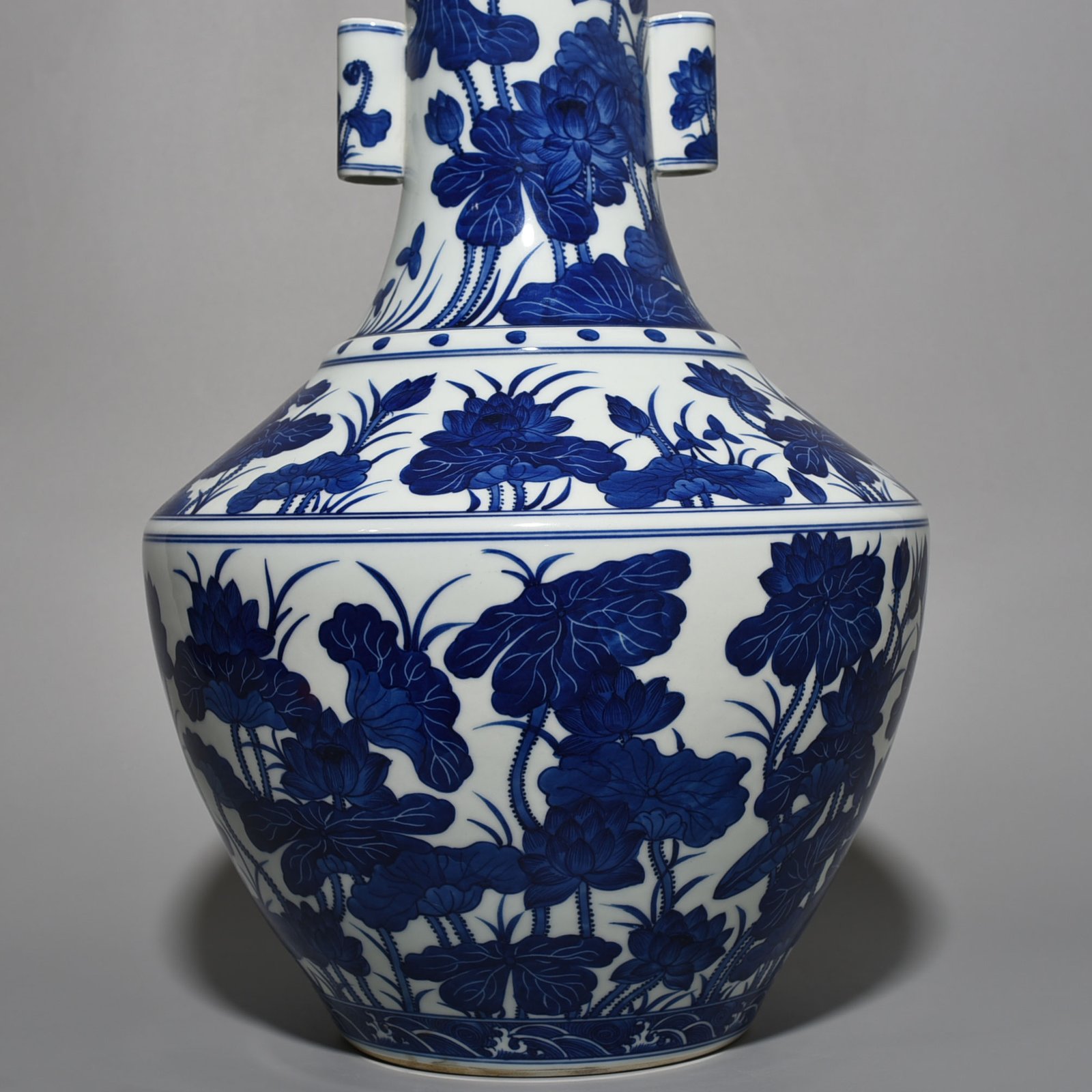 Qing Dynasty Qianlong blue and white lotus vase