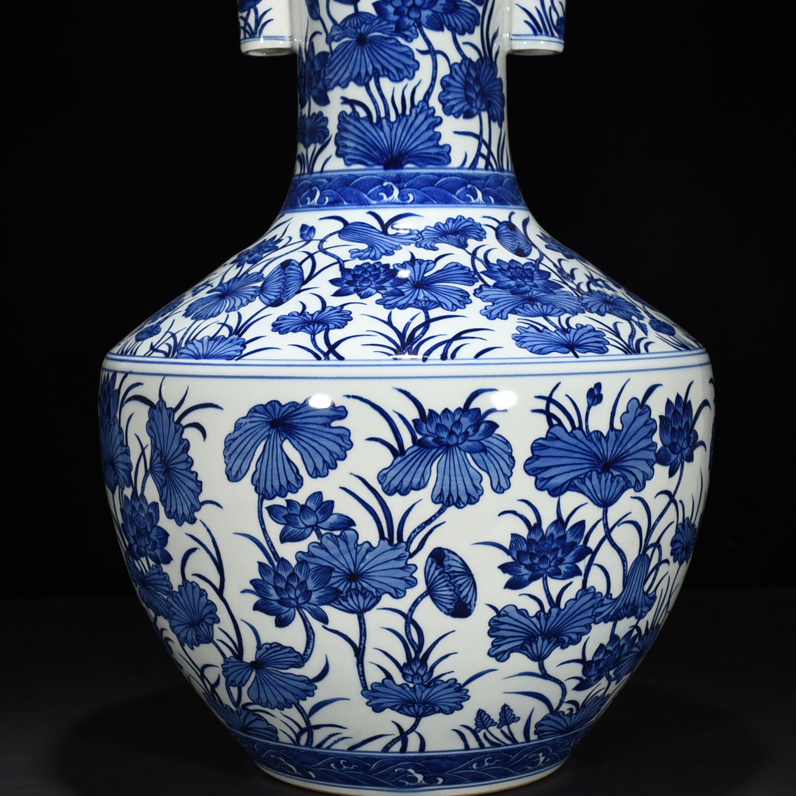 Qing Dynasty Qianlong blue and white lotus vase