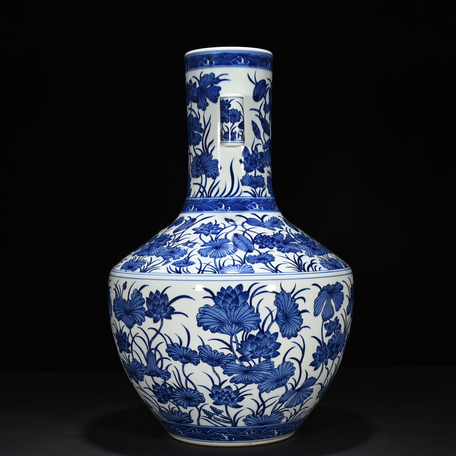 Qing Dynasty Qianlong blue and white lotus vase
