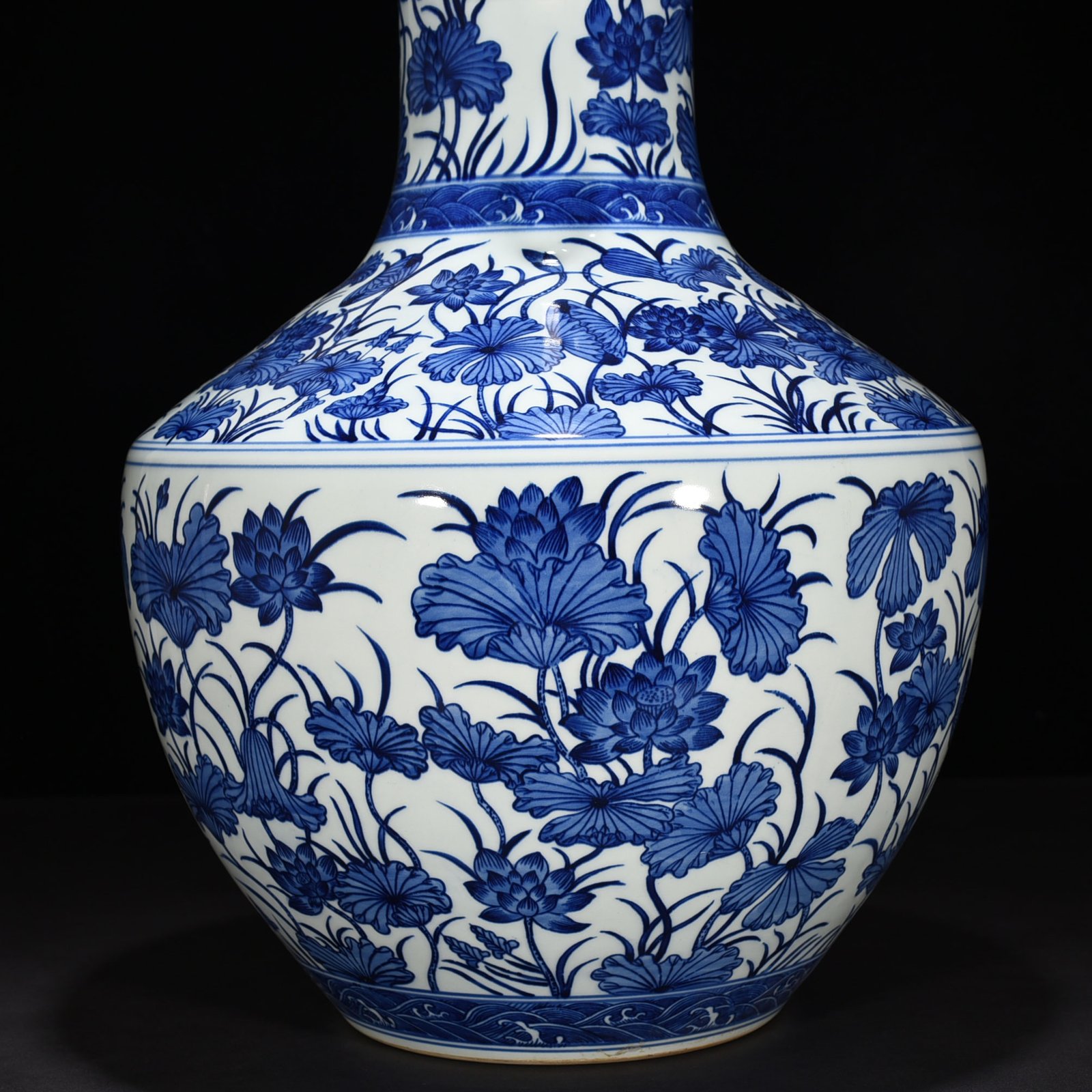 Qing Dynasty Qianlong blue and white lotus vase