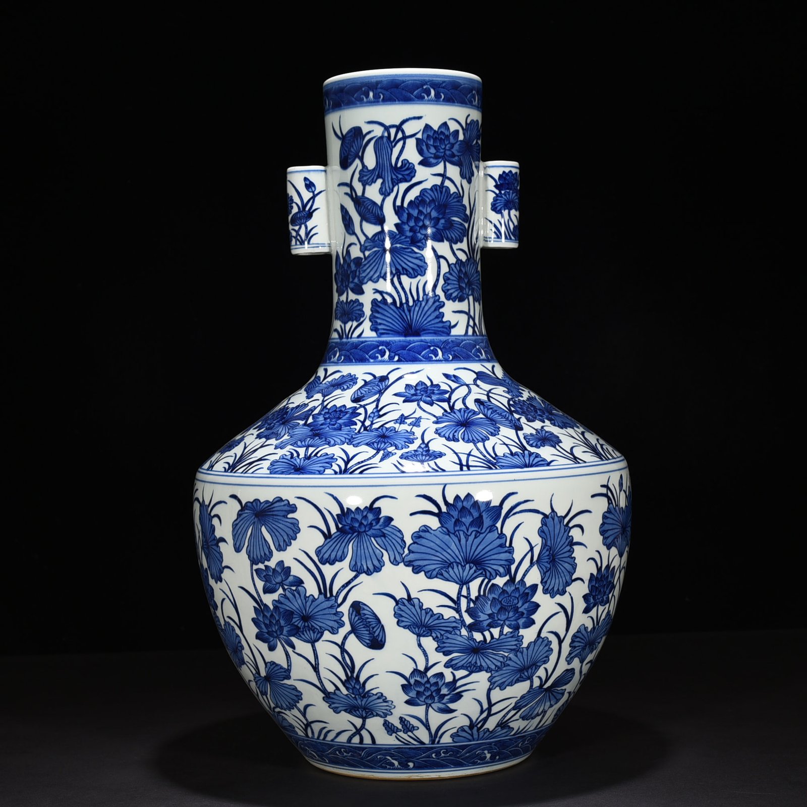 Qing Dynasty Qianlong blue and white lotus vase