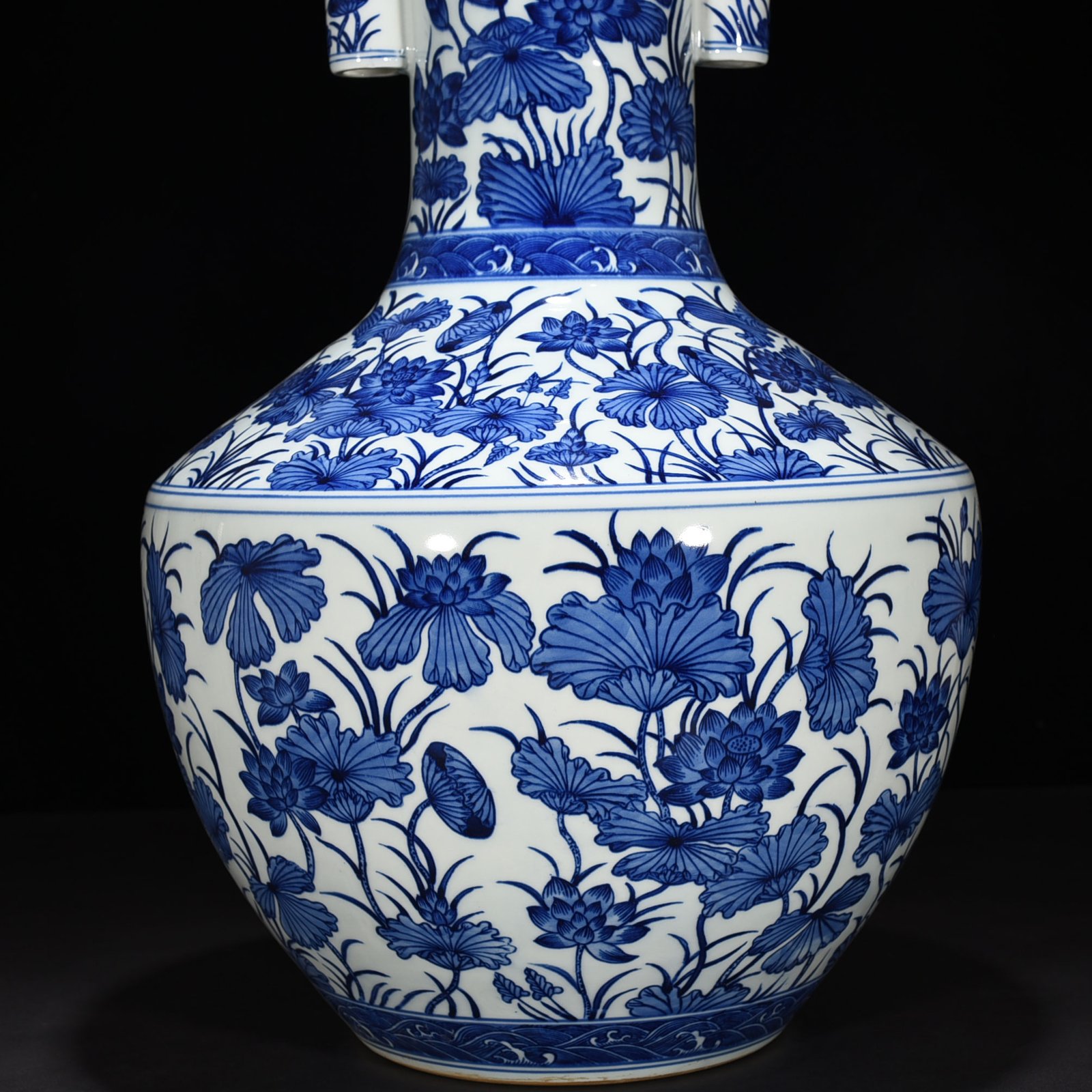 Qing Dynasty Qianlong blue and white lotus vase