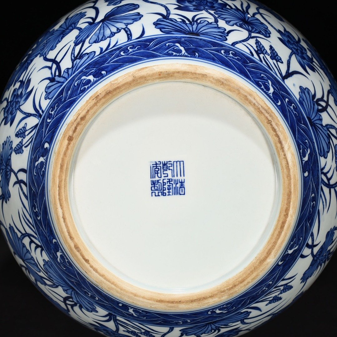 Qing Dynasty Qianlong blue and white lotus vase