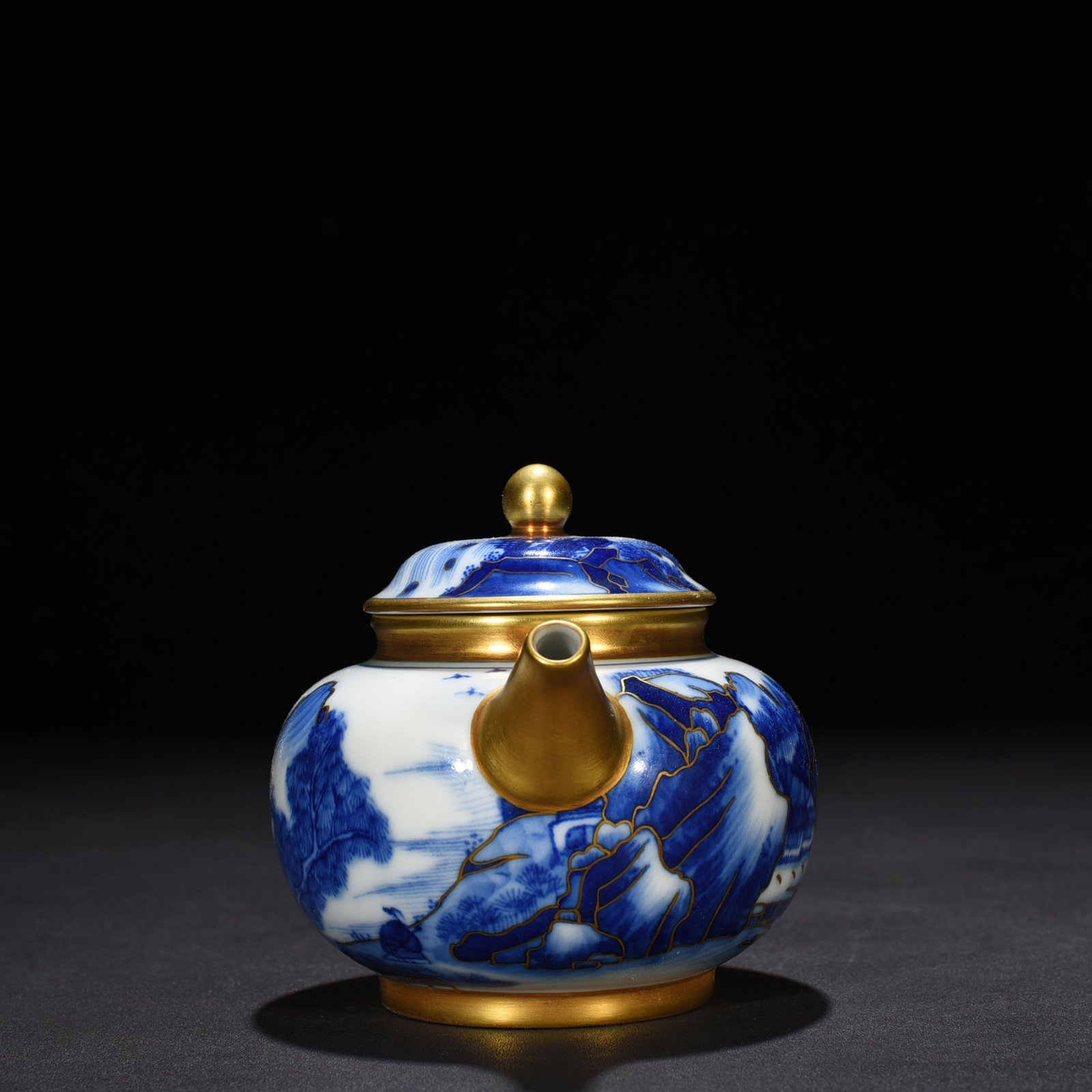Qing Dynasty Qianlong blue and white gilt landscape pot