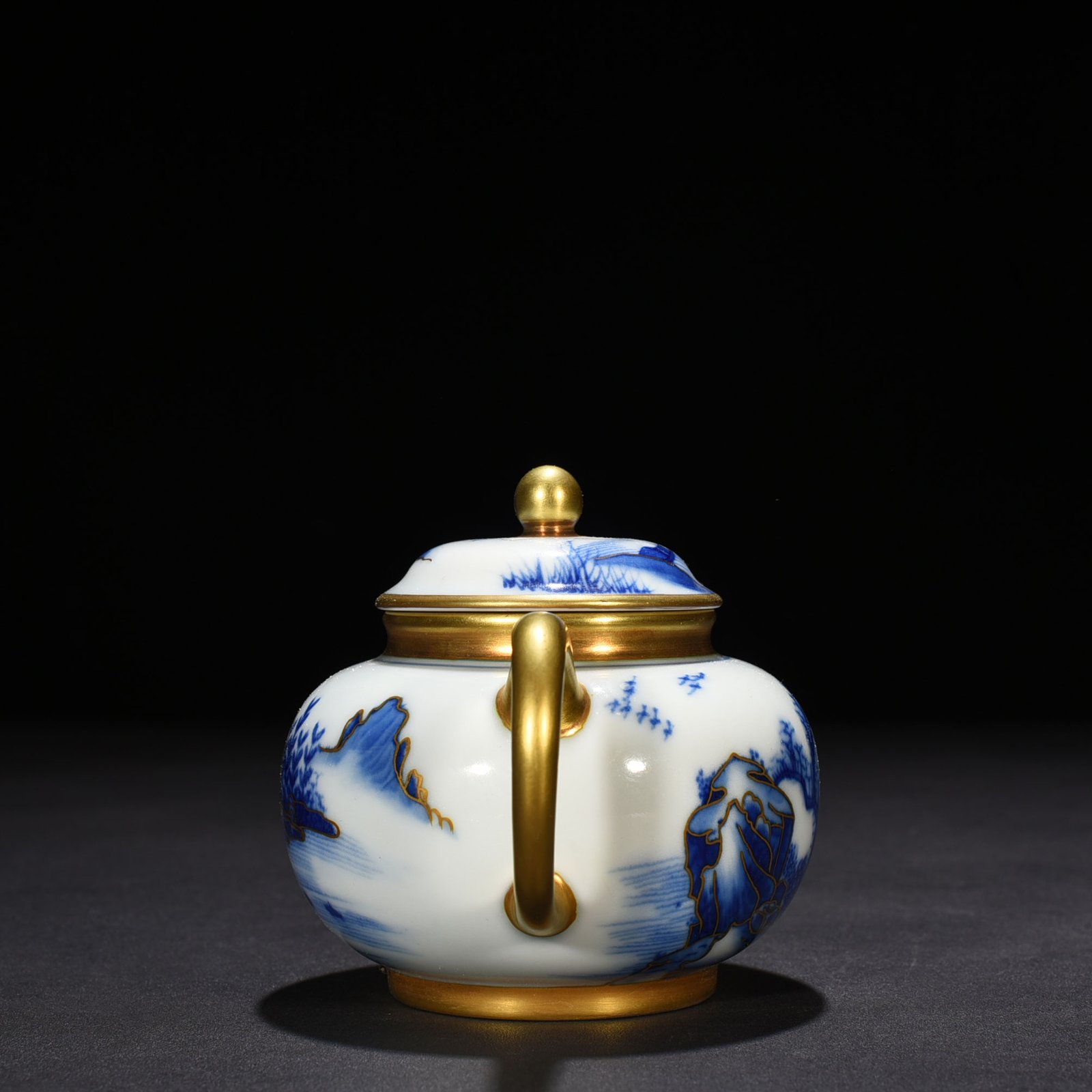 Qing Dynasty Qianlong blue and white gilt landscape pot