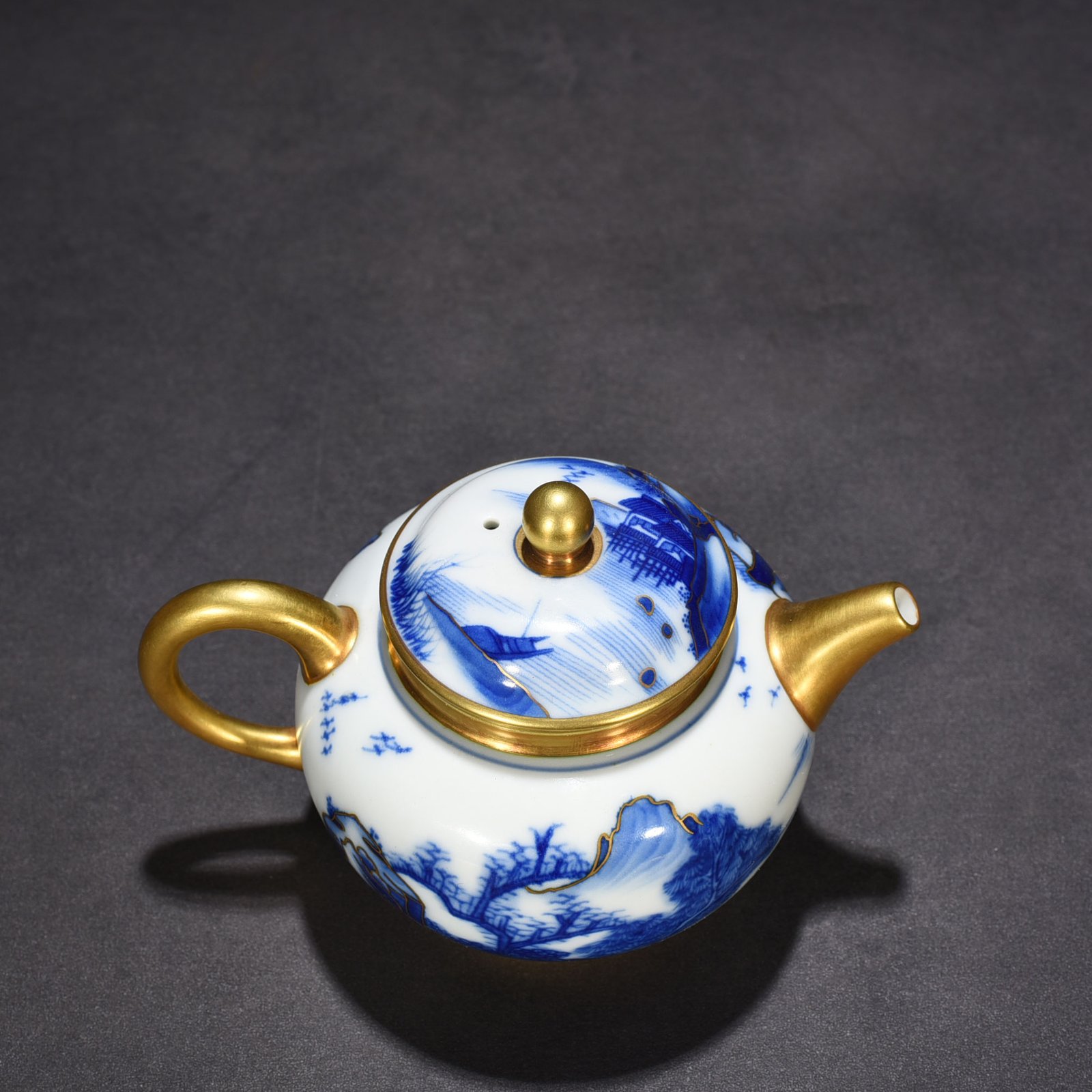 Qing Dynasty Qianlong blue and white gilt landscape pot