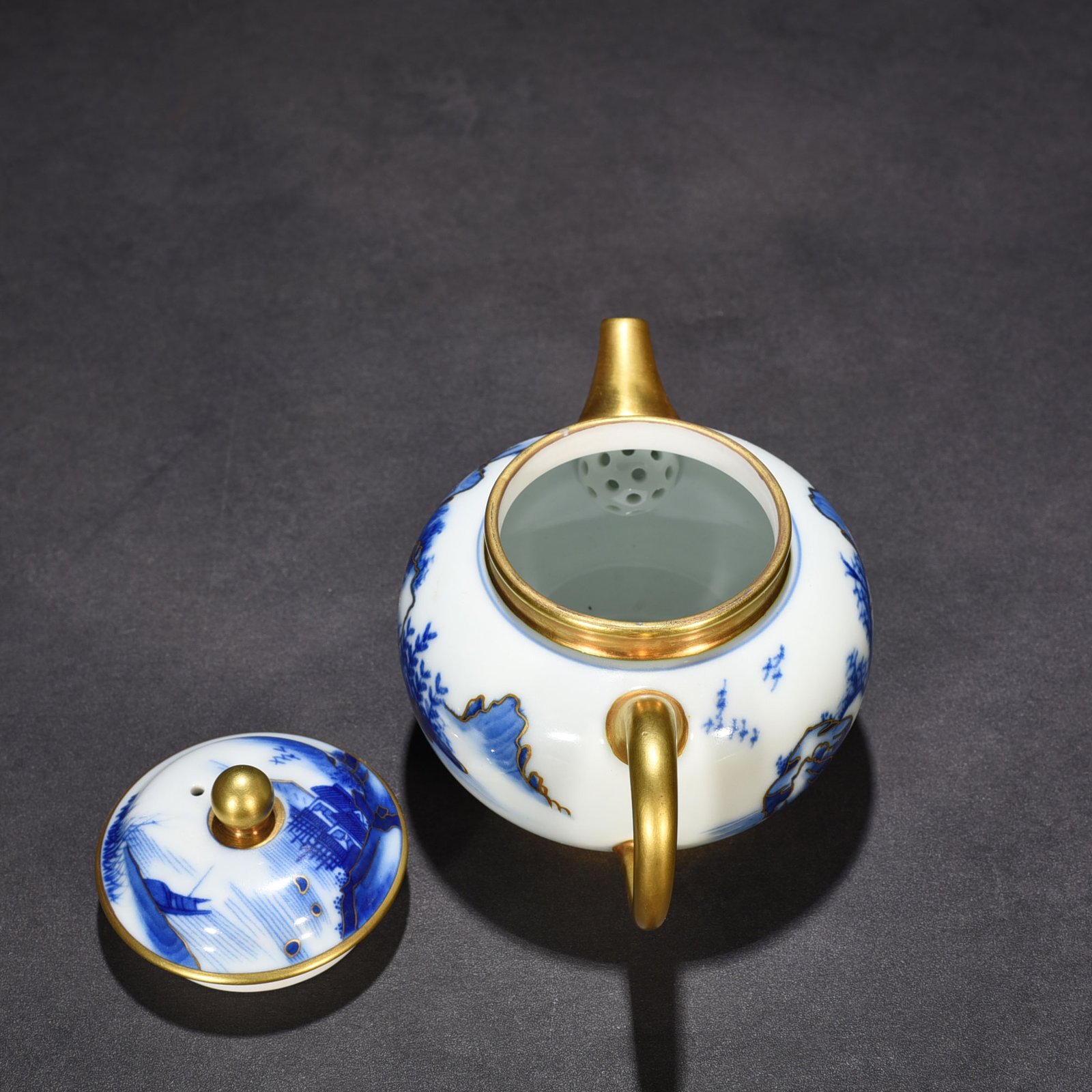 Qing Dynasty Qianlong blue and white gilt landscape pot