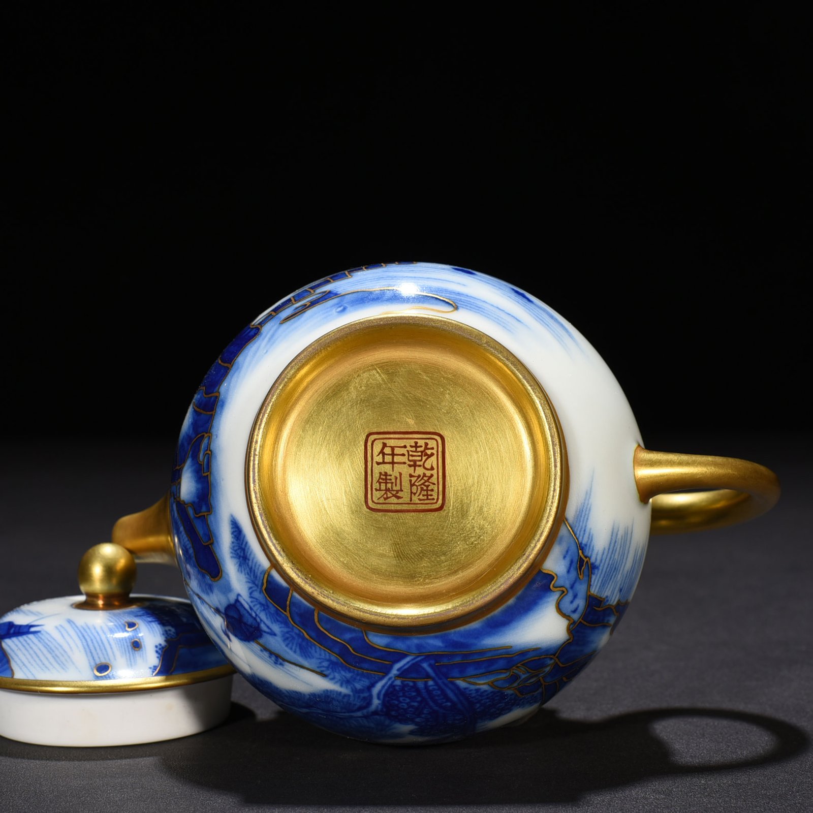 Qing Dynasty Qianlong blue and white gilt landscape pot