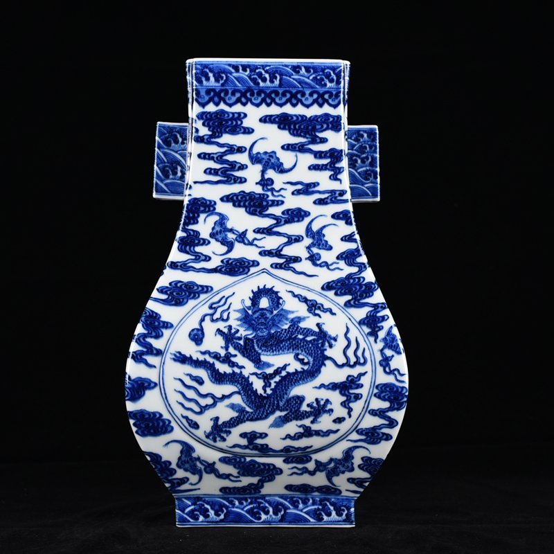 Qing Dynasty Qianlong blue and white dragon through-ear vase