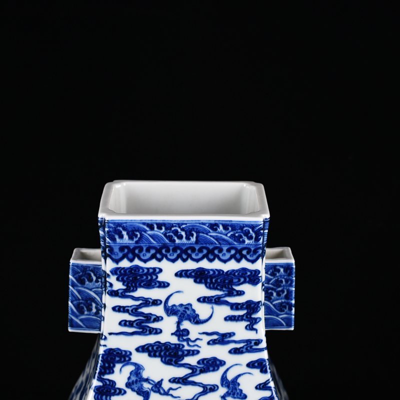 Qing Dynasty Qianlong blue and white dragon through-ear vase
