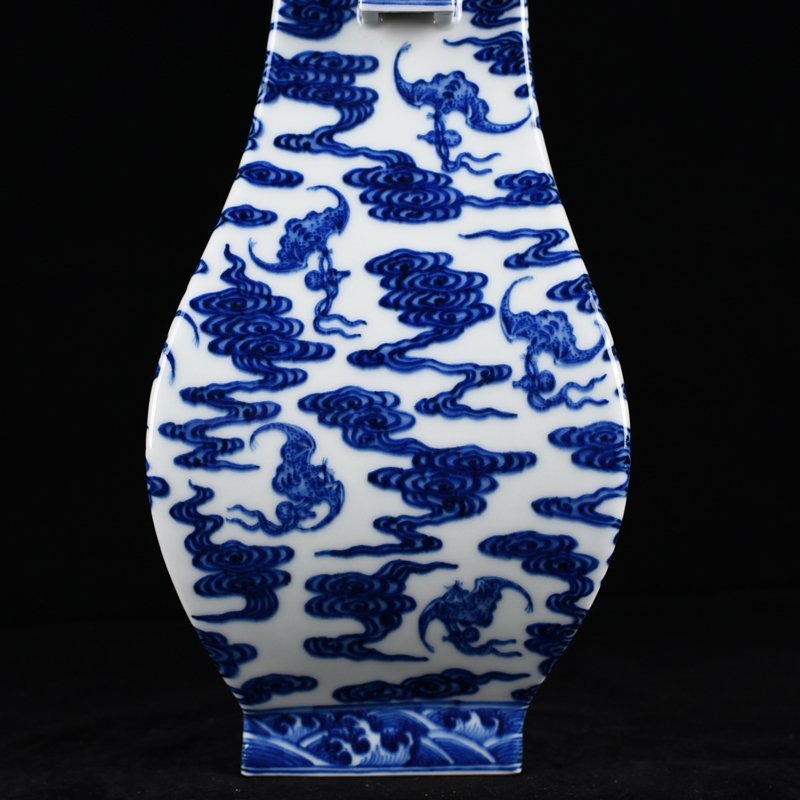 Qing Dynasty Qianlong blue and white dragon through-ear vase