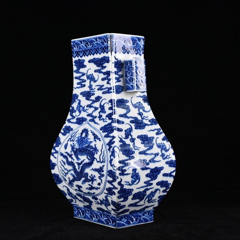 Qing Dynasty Qianlong blue and white dragon through-ear vase