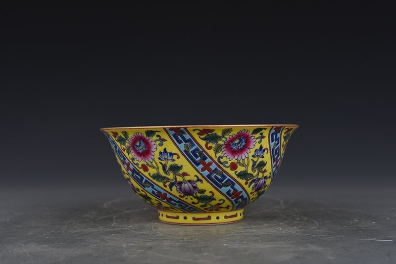 Qing Dynasty Qianlong yellow ground enamel flower bowl