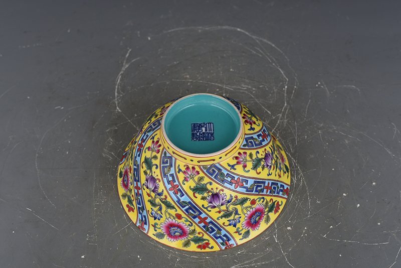 Qing Dynasty Qianlong yellow ground enamel flower bowl