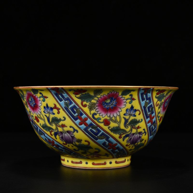 Qing Dynasty Qianlong yellow ground pastel flower bowl