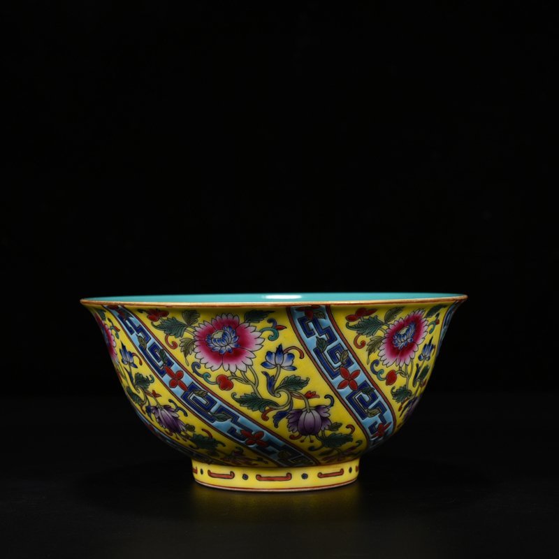 Qing Dynasty Qianlong yellow ground pastel flower bowl