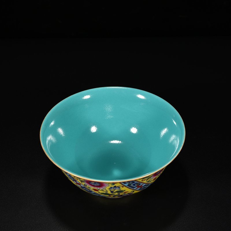 Qing Dynasty Qianlong yellow ground pastel flower bowl