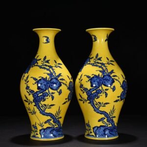 Qing Dynasty Qianlong yellow ground blue and white olive vase