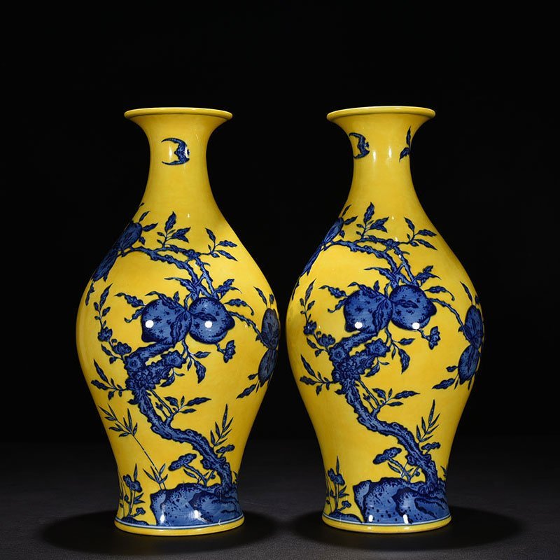Qing Dynasty Qianlong yellow ground blue and white olive vase