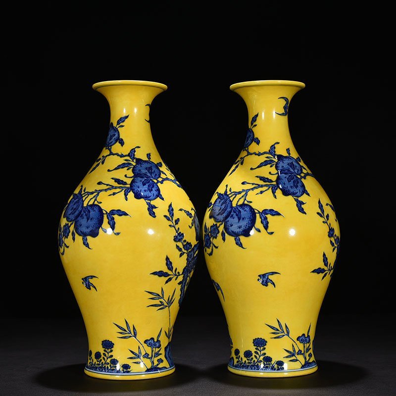 Qing Dynasty Qianlong yellow ground blue and white olive vase
