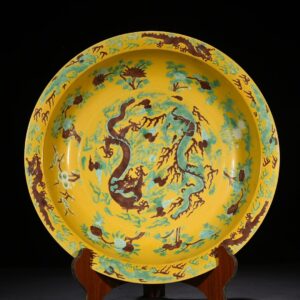 Qing Dynasty Guangxu three-color flower and dragon folding edge plate