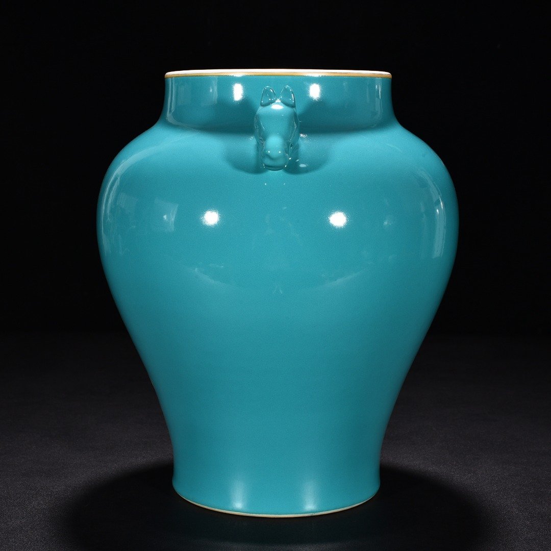 Qing Dynasty Guangxu turquoise green glaze gold dog head jar