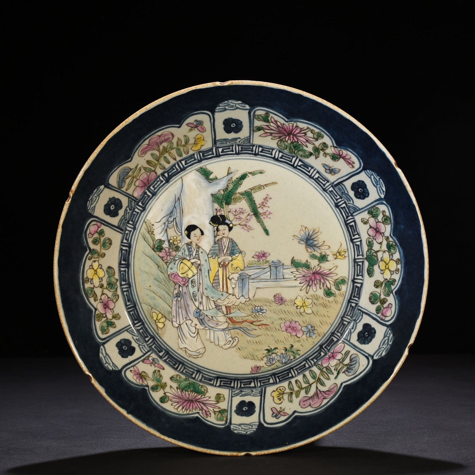 Qing Dynasty Guangxu blue and white pastel lady’s figure plate
