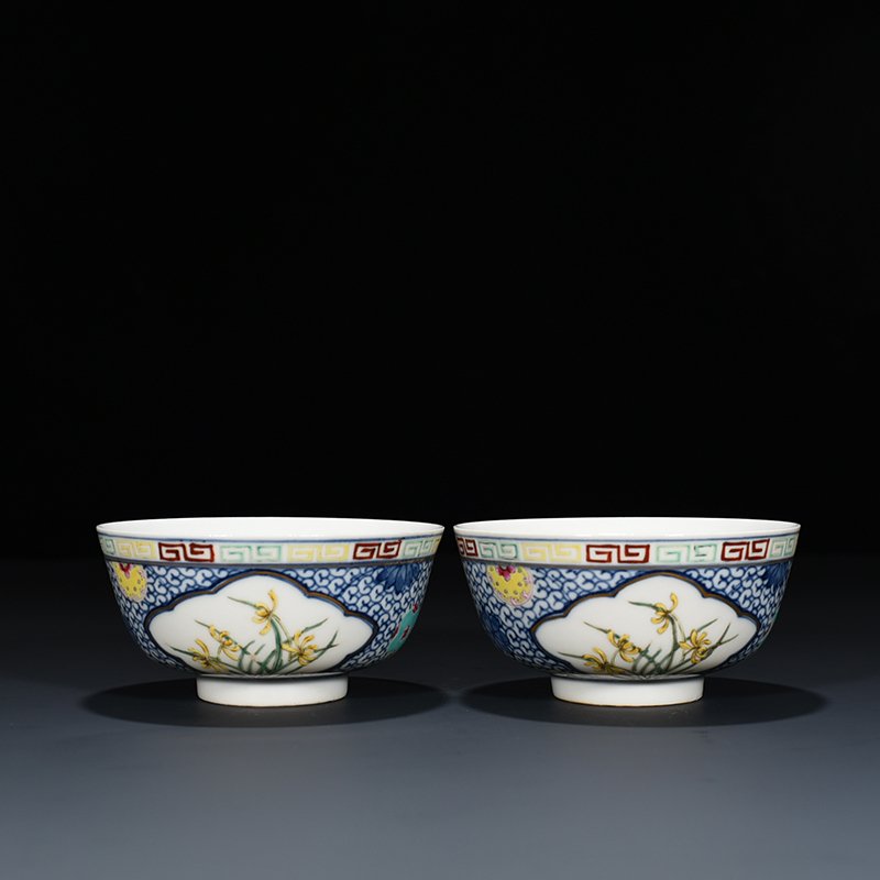 Qing Dynasty Xuantong blue and white glazed pastel orchid bowl
