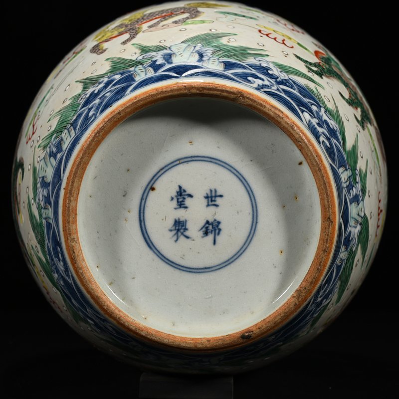 Qing Dynasty Kangxi colorful Shijintang flower unicorn jar