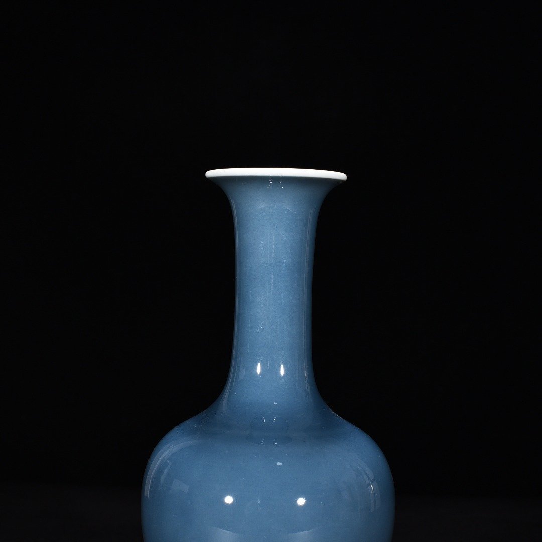 Qing Dynasty Kangxi sky blue glaze chrysanthemum petal vase