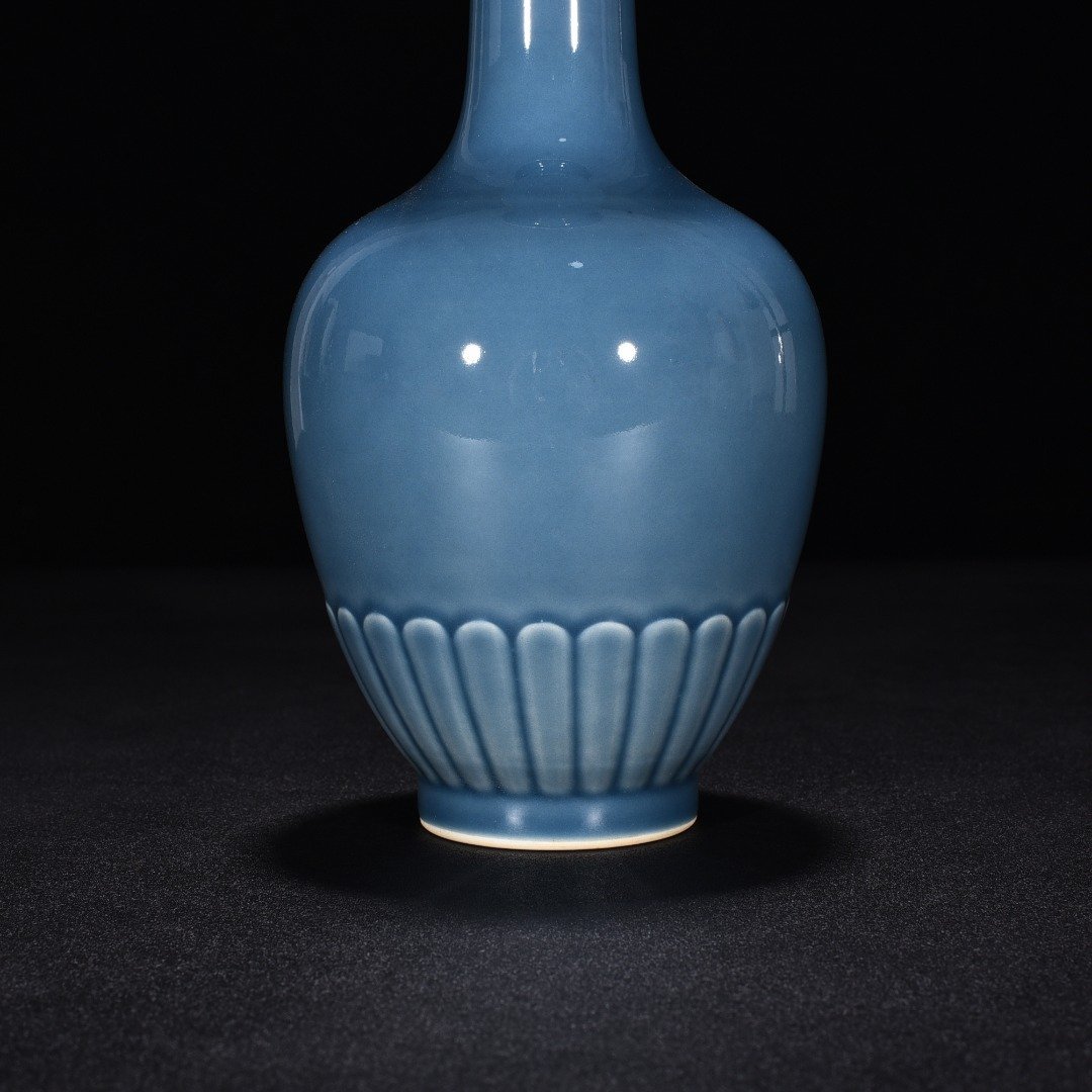 Qing Dynasty Kangxi sky blue glaze chrysanthemum petal vase