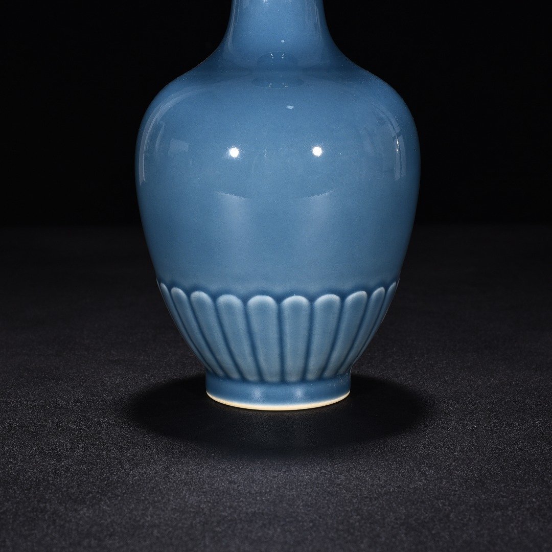 Qing Dynasty Kangxi sky blue glaze chrysanthemum petal vase
