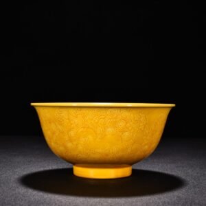 Qing Dynasty Kangxi delicate yellow glaze engraved seahorse bowl