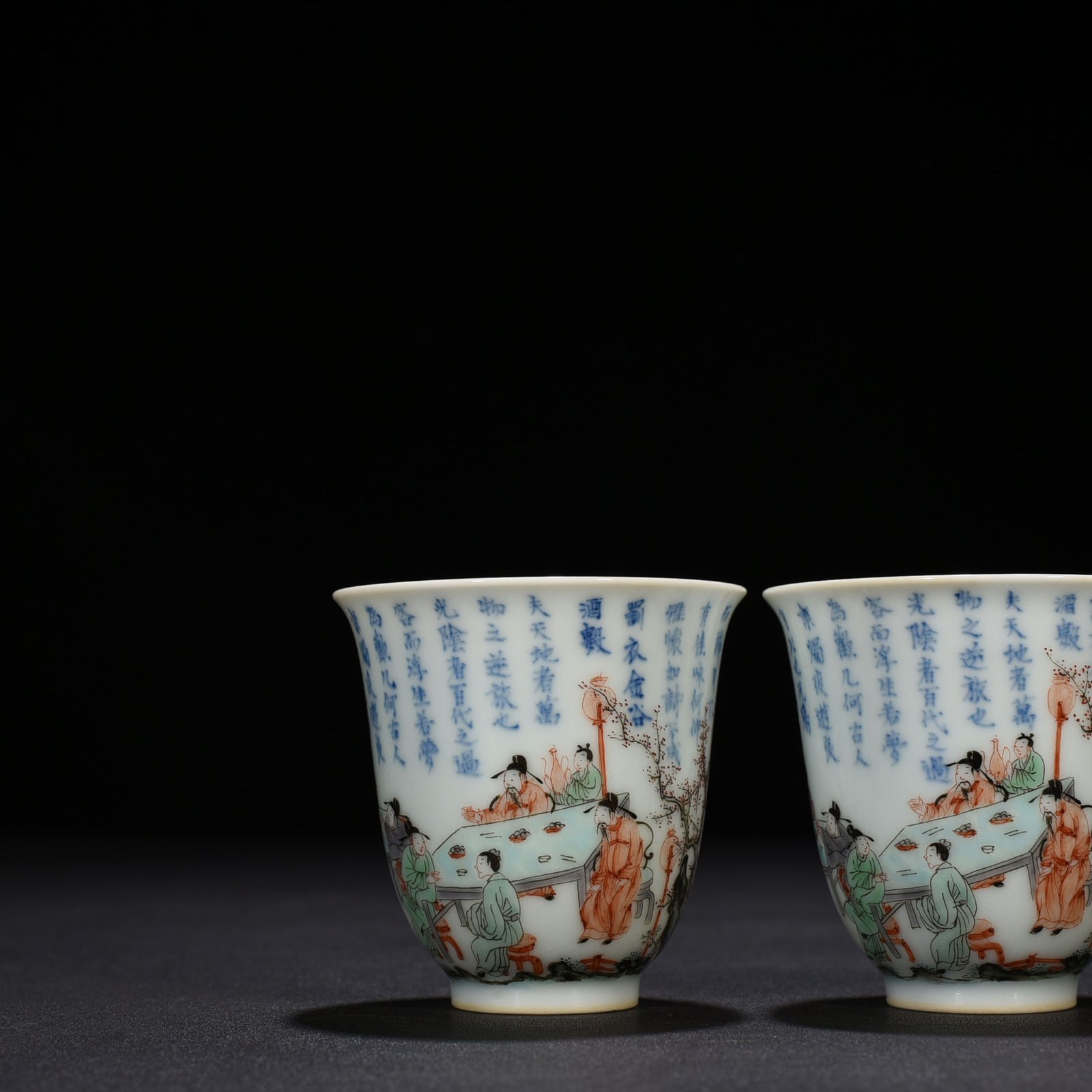 Qing Dynasty Kangxi blue and white colorful peach and plum garden poetry bell cup