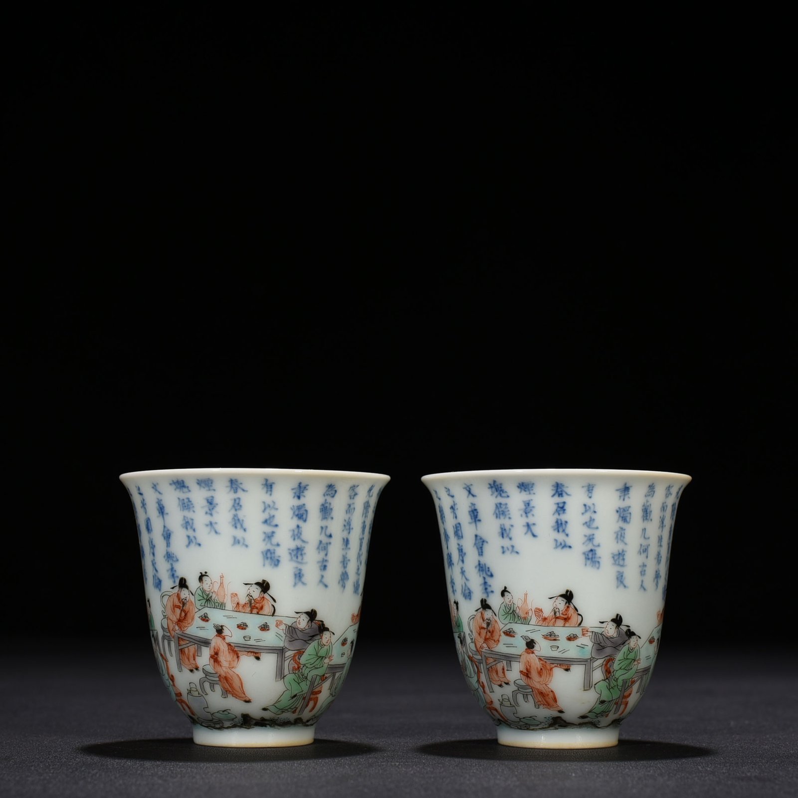 Qing Dynasty Kangxi blue and white colorful peach and plum garden poetry bell cup